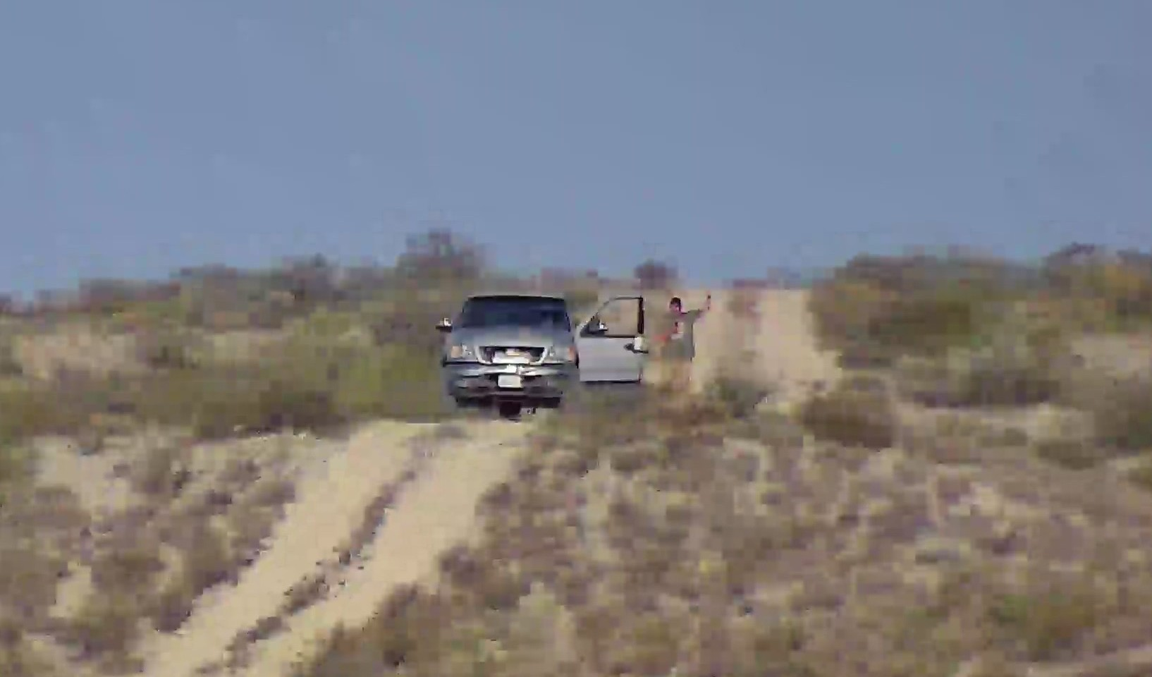 Night vision 4K surveillance capture of wildlife at nearly 1000 yards in 103 degree temperature